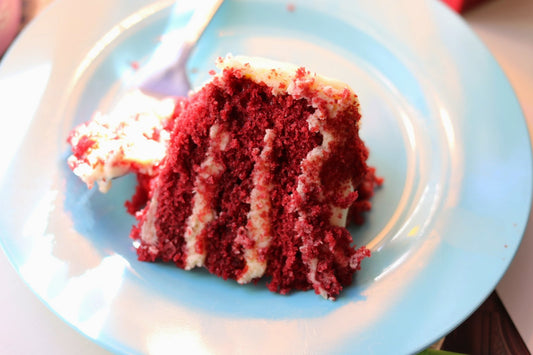 SUGAR. The Devil tempting you in a red velvet dress.