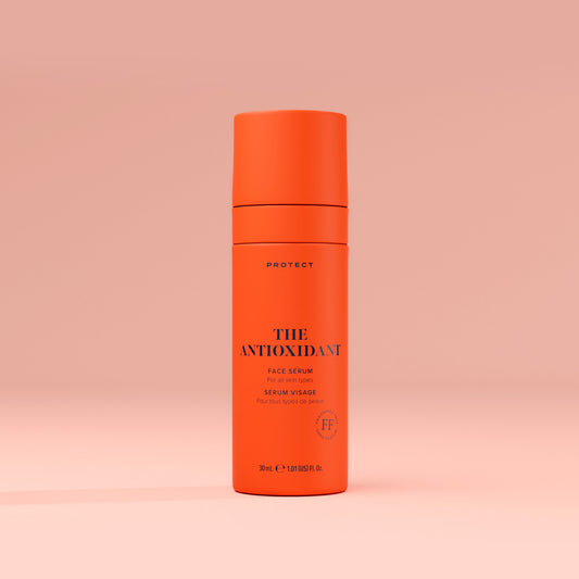 The Antioxidant daily pro-ageing protector skin care serum in orange glass refillable bottle, perfect for protecting skin against daily damage.