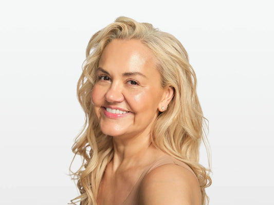 Skin Rocks by Caroline Hirons | radiant blonde woman smiling with healthy skin