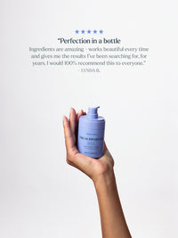 Skin Rocks by Caroline Hirons | The Support Oil facial oil held in a hand with a customer review